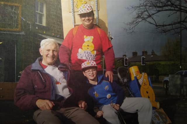 Stephen (centre) pictured with his late father Alan and son Daniel on a previous pram push