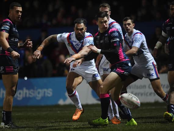 Ryan Atkins, secoond from left, in action for Wakefield. Picture by Jonathan Gawthorpe.
