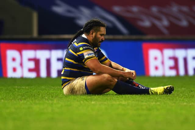 Season over: Rhinos try scorer Konrad Hurrell is left dejected at the end. Picture : Jonathan Gawthorpe
