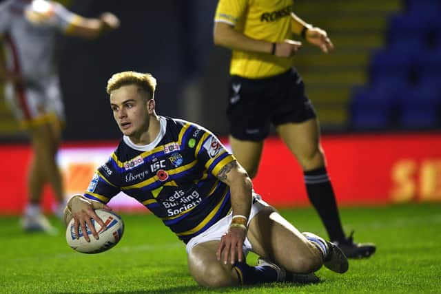 Up and running: Rhinos' Alex Sutcliffe scores his side's first try.
Picture: Jonathan Gawthorpe