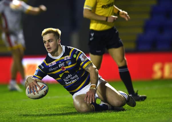 Up and running: Rhinos' Alex Sutcliffe scores his side's first try. 
Picture: Jonathan Gawthorpe