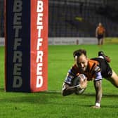 Gareth O'Brien touches down for Tigers. Picture by Jonathan Gawthorpe.