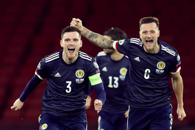 Scotland's Andrew Robertson and Liam Cooper celebrate victory in the penalty shoot-out (Picture: PA)