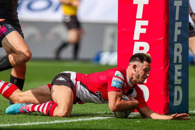 Niall Evalds scoring for Salford. Picture by Alex Whitehead/SWpix.com.
