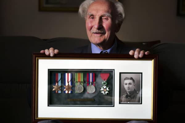 Jim Pass, pictured in 2018 with his war medals. Picture: Scott Merrylees