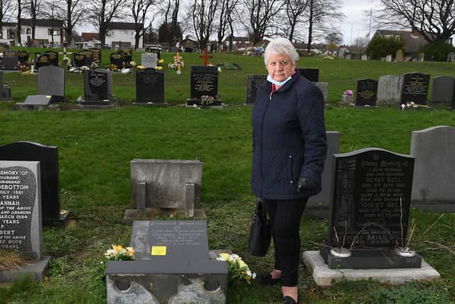 Mavis Forrest at the grave of her late husband Dennis at Rothwell Cemetery.
Leeds City Council has laid the gravestone flat after it was deemed unsafe.
2020.
Picture: Simon Hulme