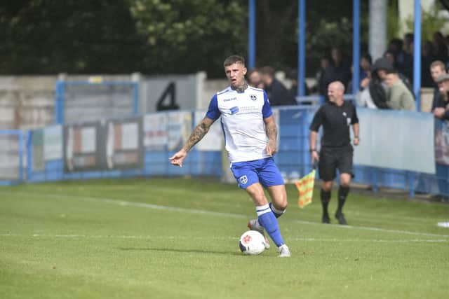 Consolation prize: Guiseley's Brad Nicholson scored a stunning free-kick for the Lions in the 4-1 defeat.