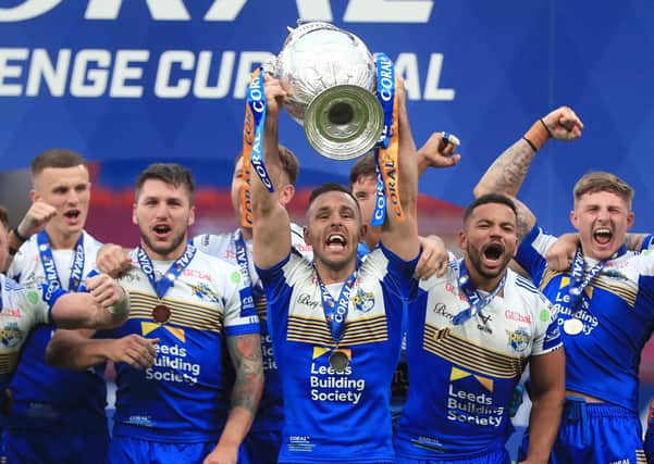 Leeds Rhinos celebrate with the Challenge Cup trophy after beating Salford Red Devils at Wembley Picture: Mike Egerton/PA