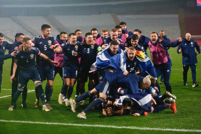 Scotland celebrate their play-off win over Serbia. (Getty)