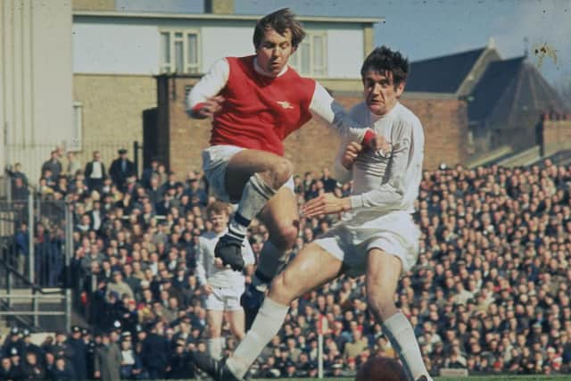 PAST BATTLES: Leeds United legend Norman Hunter, right, tackles Arsenal's David Court at Highbury back in August 1969. Picture by Allsport UK/Allsport via Getty Images.
