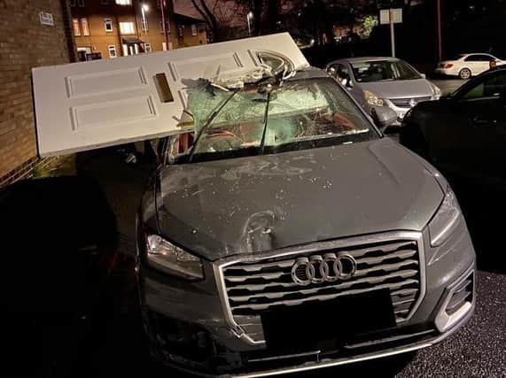 Is it a six door now? This is how police found the Audi - complete with front door wedged in the windscreen