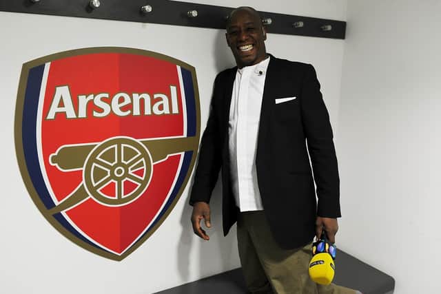 'MY TEAM': Ian Wright in front of the Arsenal badge at the Emirates but the Gunners legend has a soft spot for Marcelo Bielsa's Leeds United side. Photo by Stuart MacFarlane/Arsenal FC via Getty Images.