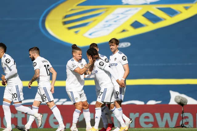 BOOST: Leeds United midfielder Kalvin Phillips, pictured centre celebrating Helder Costa's opening strike against Fulham in September, is back from a shoulder injury for Sunday's clash against Arsenal. Photo by Carl Recine - Pool/Getty Images.