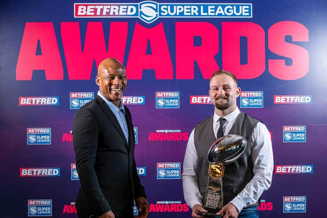 Man of Steel Paul McShane, right, with selection panel chairman Ellery Hanley.