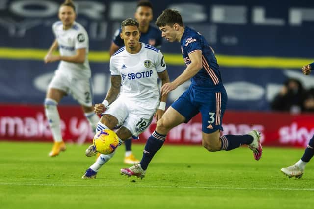 DECENT FULL DEBUT: From Leeds United's summer recruit Raphinha, left, pictured challenging Arsenal's Kieran Tierney. Picture by Tony Johnson.