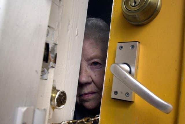 Police have issued a stark warning about doorstep scammers after a blind man and 90-year-old woman were burgled.