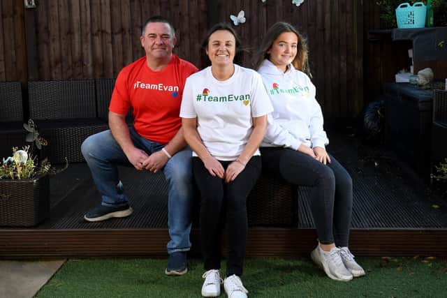 The family of Evan Hawksworth who died in a rugby match when he was 14, are fundraising for the Mission Christmas Appeal. Pictured at their home at Robin Hood, Wakefield,  are Evan's mum Michelle Hawksworth with husband Gary and and daughter Eleni.

.Picture by Simon Hulme