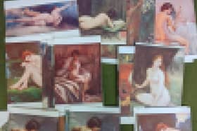 The nude postcards that were found. Thye have been blurred to protect their modesty.