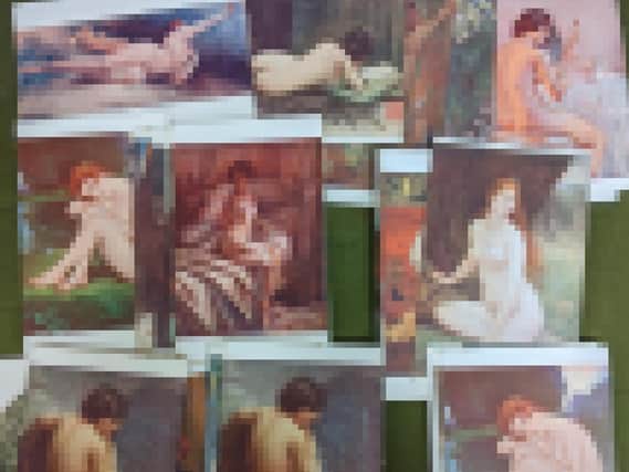 The nude postcards that were found. Thye have been blurred to protect their modesty.