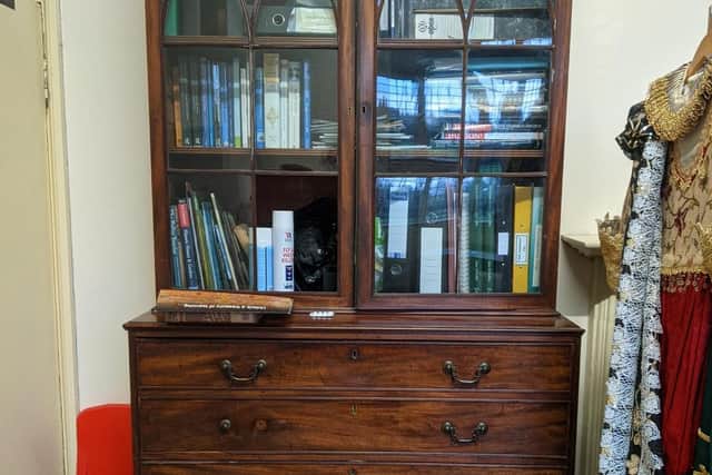 They were found in this antique desk.