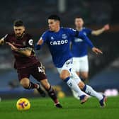 CLEAR IDEA - Leeds United are by now well versed in their man marking system and attacking philosophy, brought in by head coach Marcelo Bielsa and impressed Carlo Ancelotti at Goodison Park. Mateusz Klich is pictured chasing Everton's James Roriguez. Pic: Jonathan Gawthorpe.