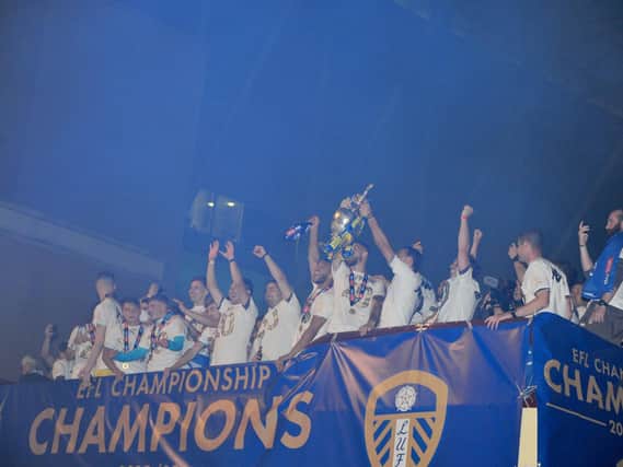The Leeds United team celebrating promotion to the Premier League.