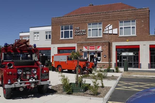 Vintage fire vehicles outside The Old Fire Station community hub in 2018.