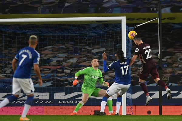 SO CLOSE - Jack Harrison heads against Jordan Pickford's post in Leeds United's 1-0 win over Everton at Goodison Park. The Manchester City loanee was playing his 100th game for the Whites. Pic: Jonathan Gawthorpe