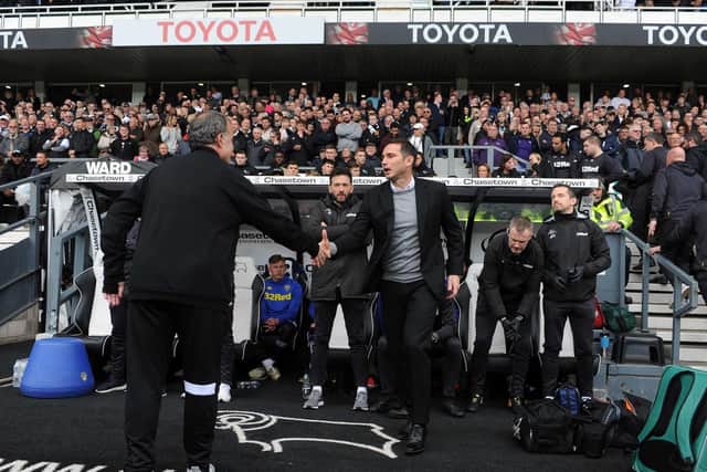 WE'LL MEET AGAIN: Leeds United head coach Marcelo Bielsa, left, and then Derby County boss Frank Lampard at Pride Park before the third of their four meetings in the 2018-19 Championship season. Picture by Tony Johnson.