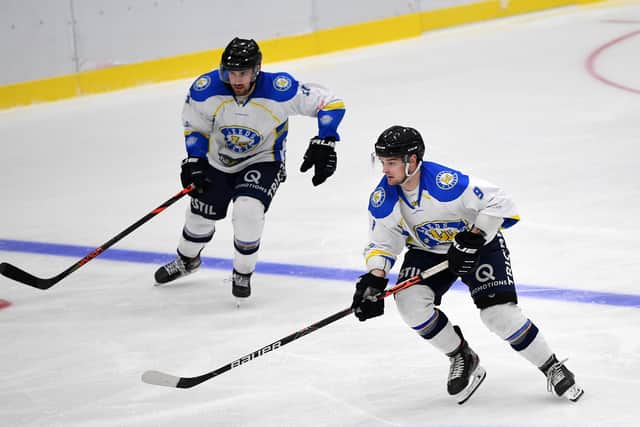 Andres Kopstals and Joe Coulter, right, get an attack going for Leeds Chiefs against Sheffield Steeldogs with team-mate Andres Kopstals on opening night at Elland Road. Picture: Jonathan Gawthorpe.