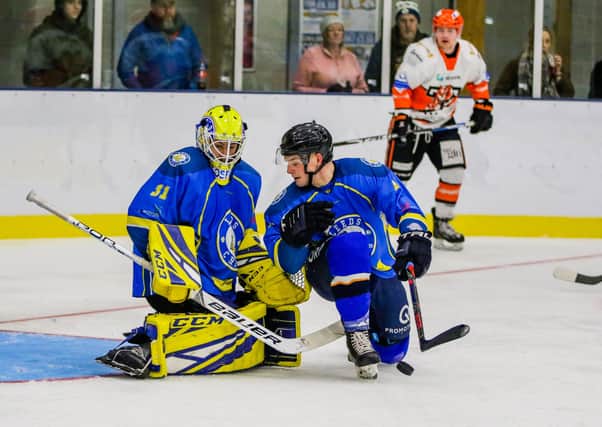 Leeds Chiefs' netminder Sam Gospel and defenceman Lewis Baldwin (right), block a shot during a clash at Elland Road last season against Telford Tigers. Picture courtesy of Mark Ferriss