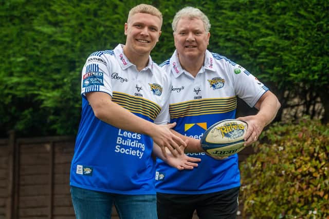Adam Smith pictured with his father Dave.
Photo: James Hardisty