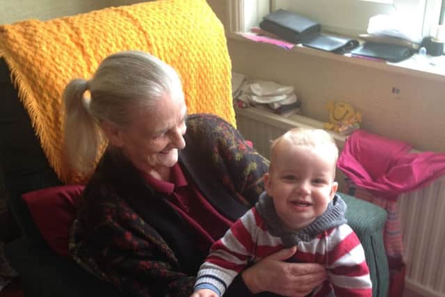 Margaret and one of her 15 great grandchildren
