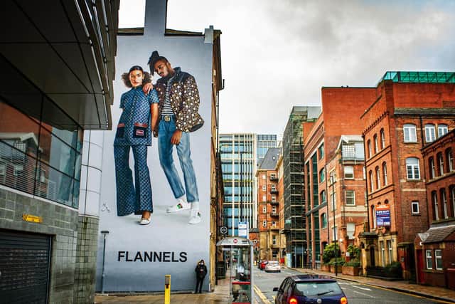 The new mural for Flannels and Gucci.