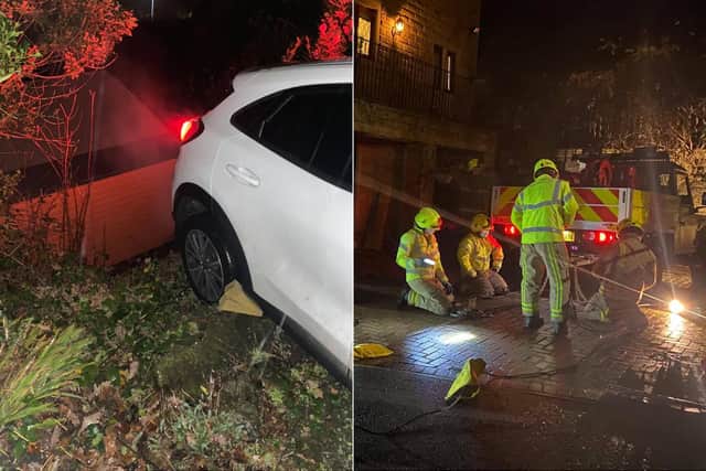 Firefighters managed to pull the car back over the steep banking edge (Photo: WYP)