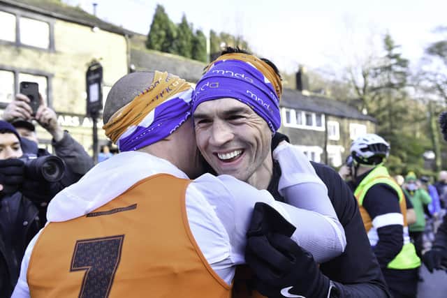 Kevin Sinfield receives a hug after completing his seventh marathon in seven days today in support of Rob Burrow and the Motor Neurone Disease Association. Picture: Simon Wilkinson.