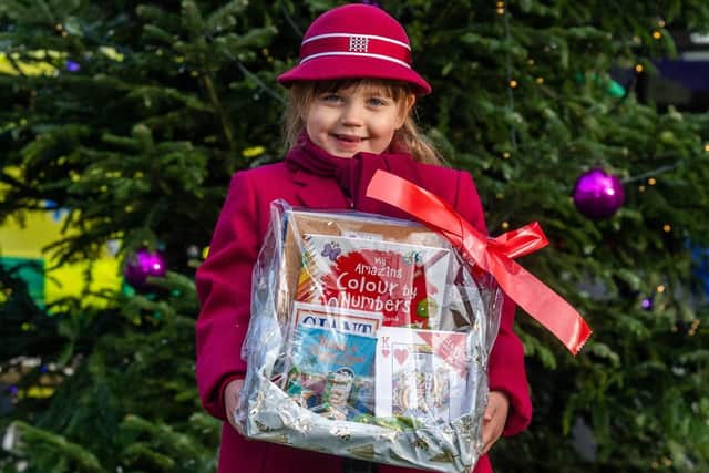 Lilyana Myers pictured with one of the Christmas hampers she has made for patients at Leeds Children's Hospital.
Piture: James Hardisty