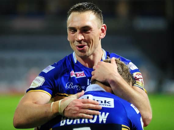 Leeds Rhinos legends Kevin Sinfield and Rob Burrow on the pitch. Picture: Steve Riding