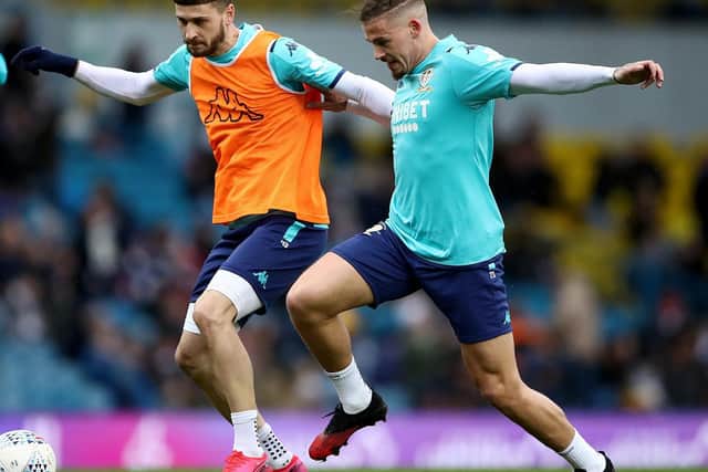 Leeds United's Mateusz Klich (L) and Kalvin Phillips (R). Pic: PA