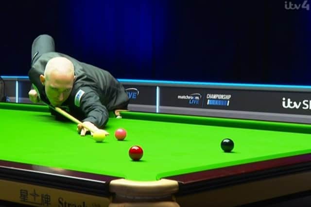 Screen grab taken from ITV4 of David Grace in action during the Championship League at Marshall Arena, Milton Keynes. PA Photo.