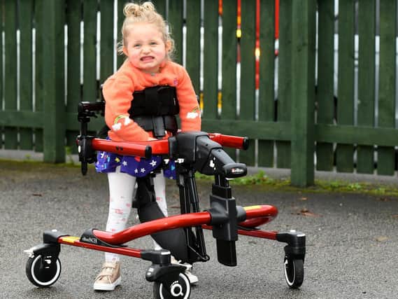 Four-year-old Tilly West suffers from Rett Syndrome. She cannot stand upright or take a step in her home without the £3,500 walker bought by charity PhysCap.