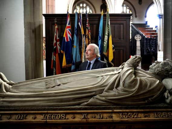 Architectural historian Dr Christopher Webster, pictured at the memorial tomb of Dr Hook inside Leeds Minster, previously known as Leeds Parish Church. PIC: Jonathan Gawthorpe