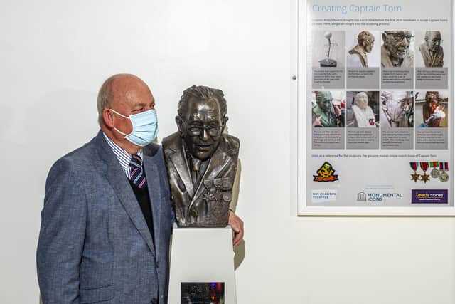 Garry McBride from Monumental Icons with a bust of Sir Tom Moore unveiled in the Leeds Cancer Centre, Bexley Wing at St James's Hospital. Picture Tony Johnson