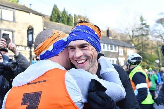 Kevin Sinfield express his joy after completing his final marathon. Picture: Simon Wilkinson/SWpix.com.