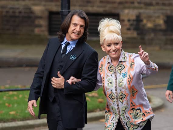 Dame Barbara Windsor and her husband Scott Mitchell arriving to deliver an Alzheimer's Society open letter to 10 Downing Street (Image: PA Wire/Dominic Lipinski)
