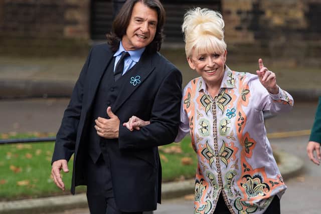 Dame Barbara Windsor and her husband Scott Mitchell arriving to deliver an Alzheimer's Society open letter to 10 Downing Street (Image: PA Wire/Dominic Lipinski)