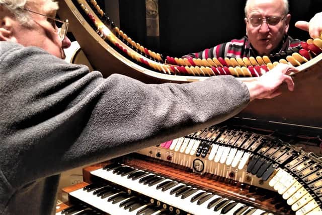 PROJECT: Stan Burrows, left, and Richard Slater get to grips with the organ’s console.