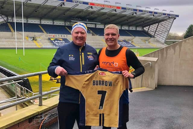 Adam Smith pictured at Headingley stadium after his duathlon challenge with dad Dave.
