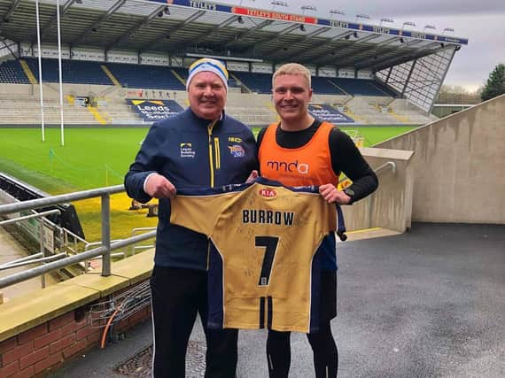 Adam  Smith pictured at Headingley stadium after his duathlon challenge with dad Dave.