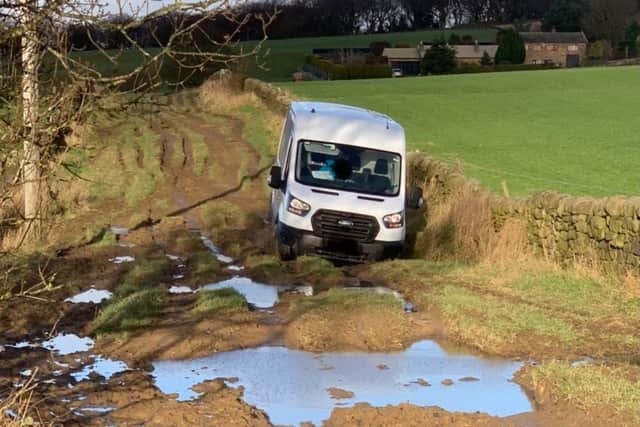 The delivery driver got stuck in the mud (photo: @WYPDogs).
